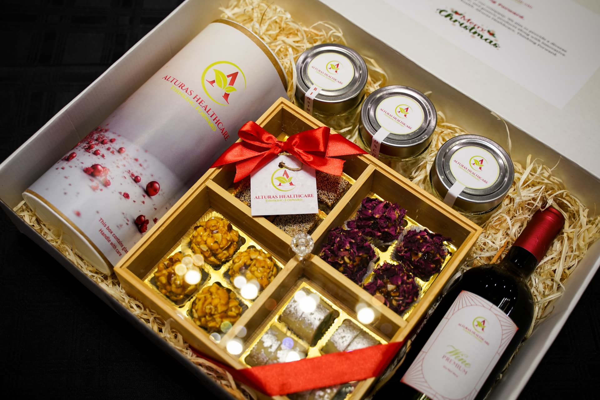 Celebrations by TCI premium hamper box with Indian sweets, jars and wine